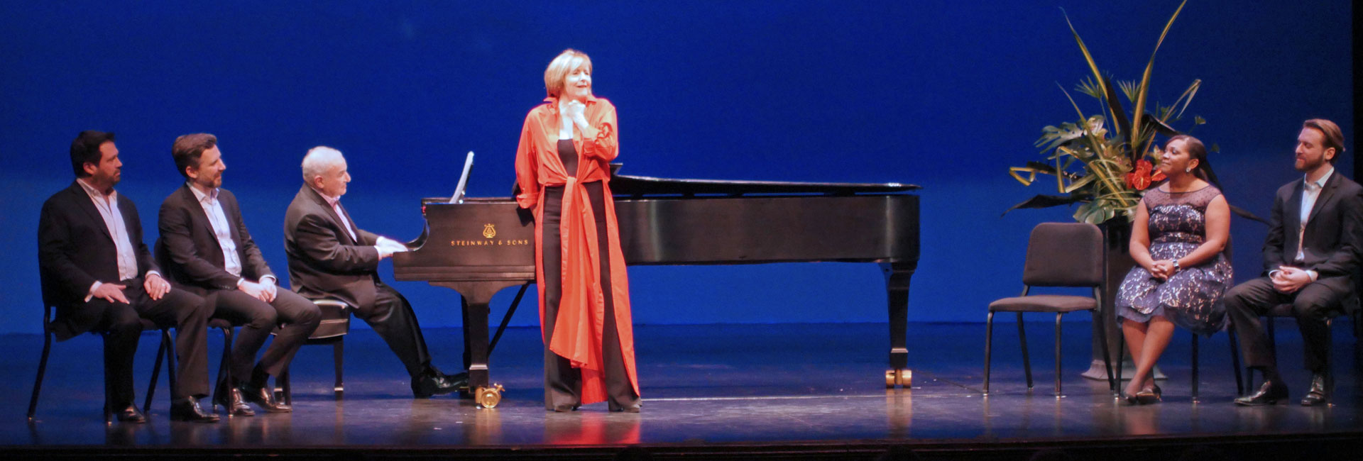 Martin Katz at the piano with an ensemble of four U-M alumni: David Daniels, William Ferguson, Janai Brugger, and Jesse Blumberg, along with Frederica von Stade (center).